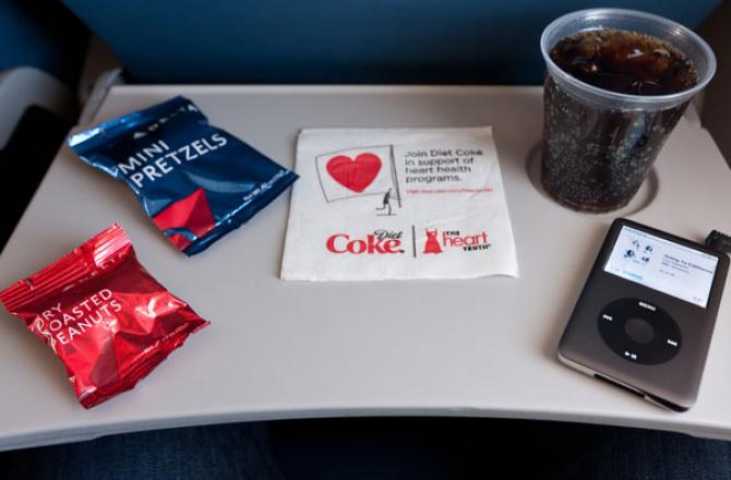 Tray table with Delta Air Lines snacks